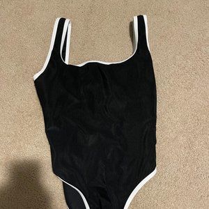 LainSnow black one piece brand new, never worn
